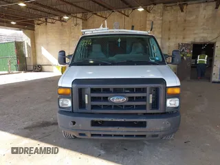2012 Ford Econoline Cargo Commercial with VIN 1FTNE1EW3CDA31914, listed as a IAAI auction lot 41622154 with 99,254 mi miles and . Bid and sale history available at carsss.com. Image 12.