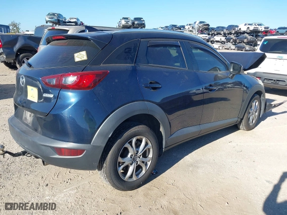 2017 Mazda CX-3 Sport with VIN JM1DKFB73H0159678, listed as a IAAI auction lot 40953743 with 99,696 mi miles. Bid and sale history available at carsss.com. Image 4.