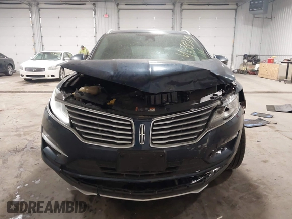 2015 Lincoln MKC with VIN 5LMTJ2AH0FUJ28744, listed as a IAAI auction lot 41888775 with 145,872 mi miles. Bid and sale history available at carsss.com. Image 12.