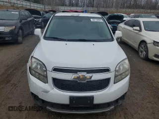 2013 Chevrolet Orlando z VIN KL77P2ETXDK019512, wystawiony jako Copart lot #84718024 z przebiegiem 133 745 mil mil oraz Tytuł czysty. Historia ofert i sprzedaży dostępna na DreamBid. Obrazek 5.