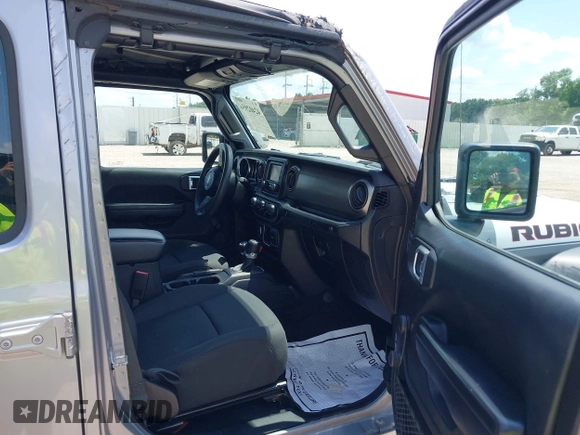 2020 Jeep Wrangler Unlimited Sport with VIN 1C4HJXDN6LW181802, listed as a IAAI auction lot 42402956 with 65,053 mi miles and . Bid and sale history available at DreamBid. Image 5.