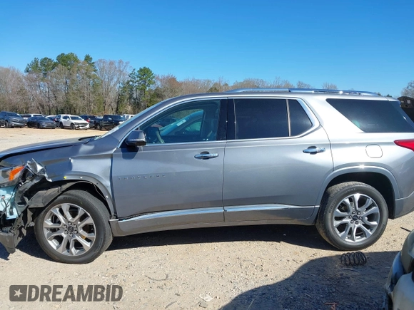 2020 Chevrolet Traverse Premier with VIN 1GNERKKW3LJ128117, listed as a IAAI auction lot 41857067 with 77,700 mi miles and . Bid and sale history available at DreamBid. Image 14.
