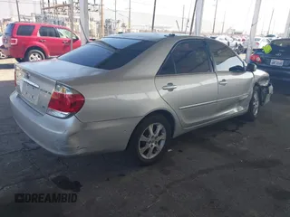 2005 Toyota Camry LE with VIN 4T1BF32K35U593310, listed as a IAAI auction lot 41997349 with 346,020 mi miles and . Bid and sale history available at DreamBid. Image 4.