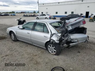2003 Cadillac Seville Luxury SLS z VIN 1G6KS54Y53U262581, wystawiony jako Copart lot #55597595 z przebiegiem 80 832 mil mil oraz Szkoda całkowita • Salvage title. Historia ofert i sprzedaży dostępna na DreamBid. Obrazek 2.