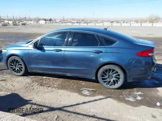 2018 Ford Fusion S with VIN 3FA6P0G77JR129224, listed as a IAAI auction lot 41483648 with 104,045 mi miles. Bid and sale history available at carsss.com. Image 14.