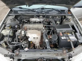 1997 Toyota Camry LE z VIN 4T1BG22K6VU106916, wystawiony jako Copart lot #56707935 z przebiegiem 235 517 mil mil oraz Szkoda całkowita • Salvage title. Historia ofert i sprzedaży dostępna na DreamBid. Obrazek 11.