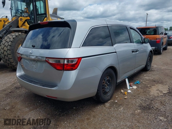2011 Honda Odyssey LX with VIN 5FNRL5H26BB027144, listed as a IAAI auction lot 42456465 with 201,901 mi miles and . Bid and sale history available at DreamBid. Image 4.