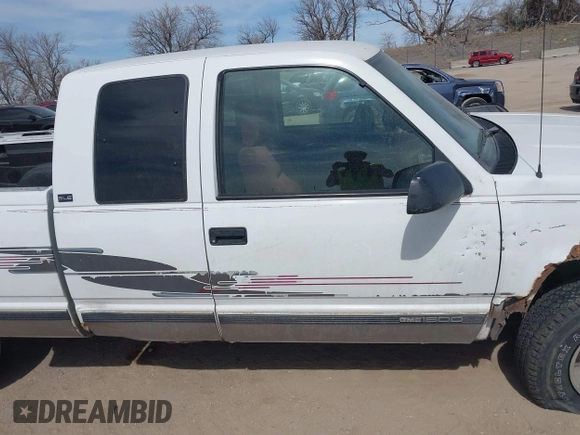 1995 GMC Sierra 1500 z VIN 2GTEK19K0S1580688, wystawiony jako IAAI lot #41811015 z przebiegiem 143 260 mil mil oraz . Historia ofert i sprzedaży dostępna na DreamBid. Obrazek 13.