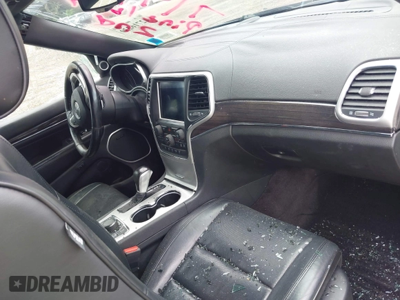 2016 Jeep Grand Cherokee Overland with VIN 1C4RJFCG0GC406160, listed as a IAAI auction lot 42716239 with 95,420 mi miles and . Bid and sale history available at DreamBid. Image 5.