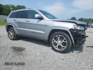 2018 Jeep Grand Cherokee Limited z VIN 1C4RJEBG4JC281330, wystawiony jako Copart lot #57954545 z przebiegiem 63 035 mil mil oraz Szkoda całkowita • Salvage title. Historia ofert i sprzedaży dostępna na DreamBid. Obrazek 4.