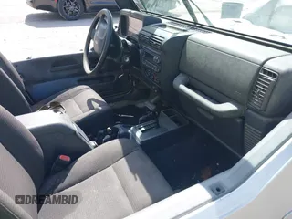 2006 Jeep Wrangler X with VIN 1J4FA39S36P703941, listed as a IAAI auction lot 42220361 with 148,829 mi miles and . Bid and sale history available at DreamBid. Image 5.