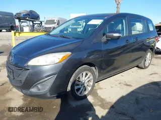 2014 Mazda 5 Sport with VIN JM1CW2BL5E0166522, listed as a IAAI auction lot 41635454 with 94,225 mi miles and . Bid and sale history available at DreamBid. Image 2.