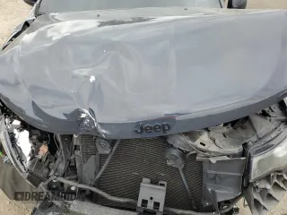 2018 Jeep Grand Cherokee Altitude z VIN 1C4RJEAG7JC392004, wystawiony jako Copart lot #53387525 z przebiegiem 103 406 mil mil oraz Szkoda całkowita • Salvage title. Historia ofert i sprzedaży dostępna na DreamBid. Obrazek 14.