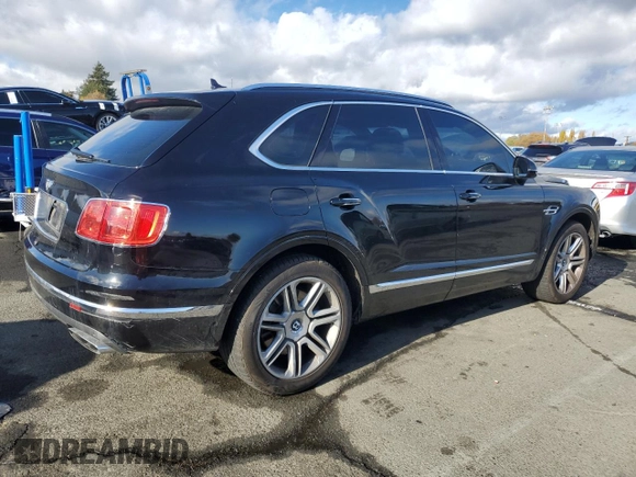 2018 Bentley Bentayga Signature z VIN SJAAC4ZV8JC019477, wystawiony jako Copart lot #80308144 z przebiegiem 59 575 mil mil oraz Szkody całkowita. Historia ofert i sprzedaży dostępna na DreamBid. Obrazek 3.