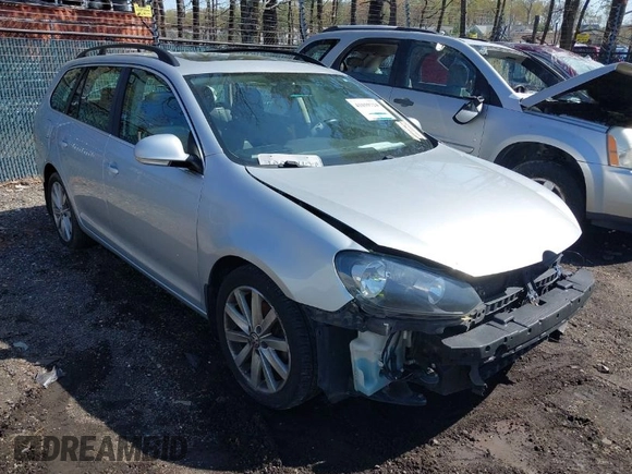 2013 Volkswagen Jetta SportWagen S with VIN 3VWPP7AJ2DM693289, listed as a IAAI auction lot 41859724 with 124,096 mi miles. Bid and sale history available at carsss.com. Image 1.