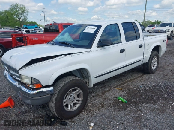 2004 Dodge Dakota SLT with VIN 1D7HG48N14S709199, listed as a IAAI auction lot 42096415 with 188,907 mi miles and . Bid and sale history available at DreamBid. Image 2.