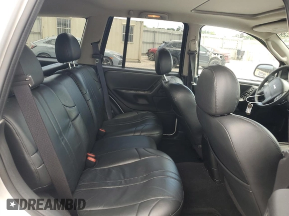 2004 Jeep Grand Cherokee Laredo z VIN 1J4GX48N94C386031, wystawiony jako Copart lot #55804755 z przebiegiem 160 103 mil mil oraz Szkoda całkowita • Salvage title. Historia ofert i sprzedaży dostępna na DreamBid. Obrazek 11.