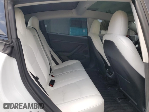 2023 Tesla Model 3 с VIN 5YJ3E1EA2PF552214, выставлен на аукционе Copart как лот 56596875 с пробегом 38 356 миль миль и Списание • Salvage title. История ставок и продаж доступна на DreamBid. Изображение 10.
