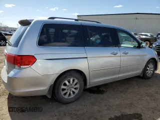 2010 Honda Odyssey EX-L with VIN 5FNRL3H60AB501157, listed as a Copart auction lot 54698995 with 277,974 mi miles and Salvage Title. Bid and sale history available at carsss.com. Image 3.
