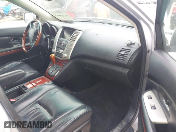 2008 Lexus RX 400h with VIN JTJHW31U482853485, listed as a IAAI auction lot 42145051 with 199,230 mi miles and . Bid and sale history available at DreamBid. Image 5.