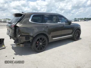 2020 Kia Telluride EX with VIN 5XYP34HC4LG004210, listed as a Copart auction lot 61686495 with 87,198 mi miles and Salvage title. Bid and sale history available at DreamBid. Image 3.