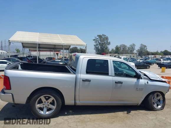 2015 Ram 1500 Express z VIN 1C6RR6KGXFS605044, wystawiony jako IAAI lot #42476988 z przebiegiem 100 498 mil mil oraz . Historia ofert i sprzedaży dostępna na DreamBid. Obrazek 14.