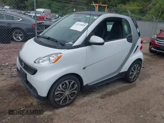 2014 Smart fortwo Pure with VIN WMEEJ3BA5EK749285, listed as a IAAI auction lot 42231893 with 119,507 mi miles and . Bid and sale history available at DreamBid. Image 2.