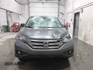 2013 Honda CR-V EX with VIN 2HKRM4H59DH682484, listed as a IAAI auction lot 41504589 with 208,260 mi miles and . Bid and sale history available at DreamBid. Image 12.