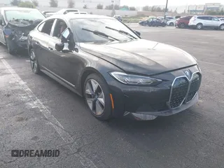 2023 BMW i4 eDrive35 z VIN WBY43AW02PFP50656, wystawiony jako IAAI lot #41776504 z przebiegiem 18 024 mil mil oraz . Historia ofert i sprzedaży dostępna na DreamBid. Obrazek 1.