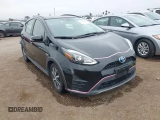 2018 Toyota Prius One z VIN JTDKDTB3XJ1606505, wystawiony jako IAAI lot #42425652 z przebiegiem 148 399 mil mil oraz . Historia ofert i sprzedaży dostępna na DreamBid. Obrazek 1.