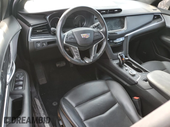 2023 Cadillac XT5 FWD Premium Luxury z VIN 1GYKNCRS0PZ173923, wystawiony jako Copart lot #52212695 z przebiegiem Nie podano mil oraz Szkoda całkowita • Salvage title. Historia ofert i sprzedaży dostępna na DreamBid. Obrazek 8.