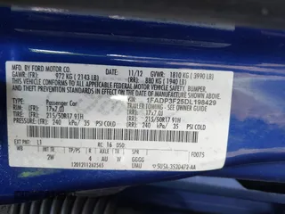 2013 Ford Focus SE with VIN 1FADP3F25DL198429, listed as a IAAI auction lot 41136019 with 123,810 mi miles. Bid and sale history available at carsss.com. Image 9.