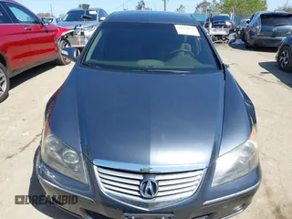2006 Acura RL z VIN JH4KB16516C004396, wystawiony jako IAAI lot #41959850 z przebiegiem 114 670 mil mil oraz . Historia ofert i sprzedaży dostępna na DreamBid. Obrazek 11.