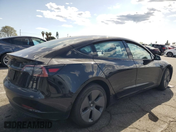 2023 Tesla Model 3 z VIN 5YJ3E1EA3PF713735, wystawiony jako Copart lot #51821995 z przebiegiem Nie podano mil oraz Szkoda całkowita • Salvage title. Historia ofert i sprzedaży dostępna na DreamBid. Obrazek 3.