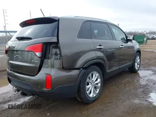 2015 Kia Sorento EX with VIN 5XYKU4A72FG621744, listed as a IAAI auction lot 41877451 with 105,898 mi miles. Bid and sale history available at carsss.com. Image 4.