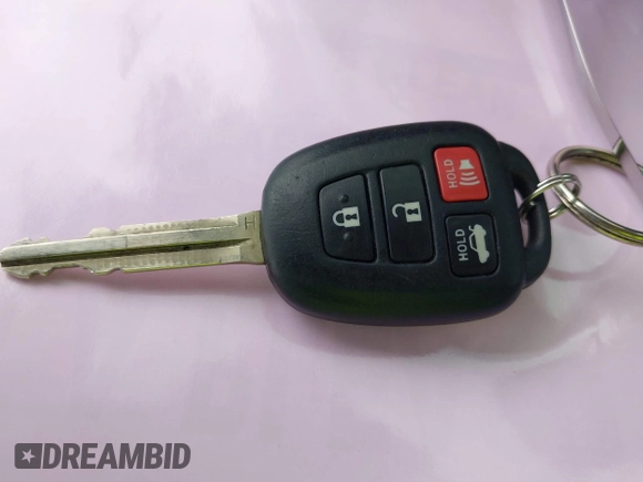 2019 Toyota Corolla L with VIN 5YFBURHE0KP875377, listed as a IAAI auction lot 41904405 with 73,604 mi miles and . Bid and sale history available at DreamBid. Image 11.