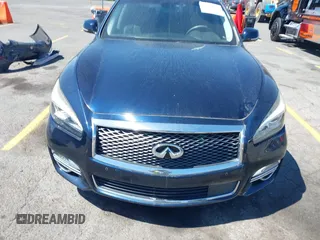 2015 Infiniti Q70 with VIN JN1BY1PP8FM601834, listed as a IAAI auction lot 42028330 with 106,285 mi miles and . Bid and sale history available at DreamBid. Image 12.