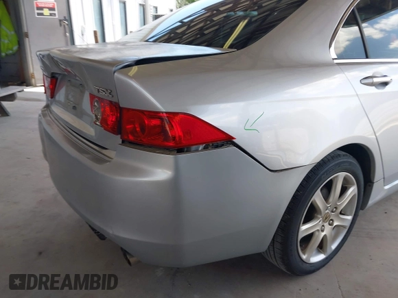 2005 Acura TSX with VIN JH4CL96855C011098, listed as a IAAI auction lot 42310643 with 214,749 mi miles and . Bid and sale history available at DreamBid. Image 14.