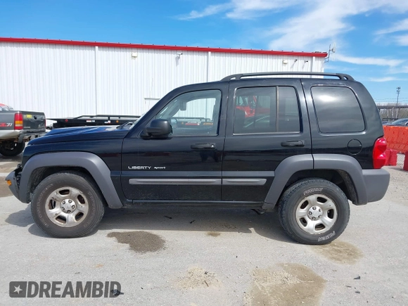 2003 Jeep Liberty Sport with VIN 1J4GL48KX3W530569, listed as a IAAI auction lot 41857397 with 172,303 mi miles. Bid and sale history available at carsss.com. Image 14.