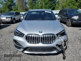 2021 BMW X1 sDrive28i z VIN WBXJG7C06M5U15436, wystawiony jako Copart lot #52382635 z przebiegiem 57 917 mil mil oraz Szkody całkowita. Historia ofert i sprzedaży dostępna na DreamBid. Obrazek 5.