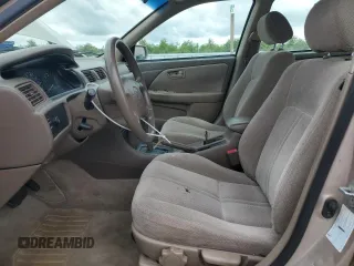 2000 Toyota Camry CE with VIN 4T1BG22K1YU621861, listed as a Copart auction lot 51611275 with 153,153 mi miles and Salvage Title. Bid and sale history available at carsss.com. Image 6.