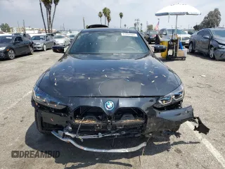 2024 BMW i4 M50 with VIN WBY33AW09RFS37404, listed as a Copart auction lot 51594984 with 776 mi miles and Salvage Title. Bid and sale history available at carsss.com. Image 5.