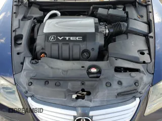2005 Acura RL z VIN JH4KB165X5C004380, wystawiony jako Copart lot #54139035 z przebiegiem 144 934 mil mil oraz Szkoda całkowita • Salvage title. Historia ofert i sprzedaży dostępna na DreamBid. Obrazek 11.