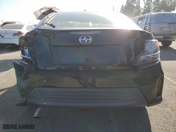 2016 Scion tC with VIN JTKJF5C79GJ020110, listed as a Copart auction lot 86995214 with 79,165 mi miles and Salvage Title. Bid and sale history available at carsss.com. Image 6.