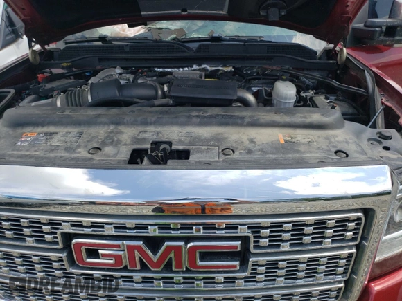 2019 GMC Sierra 3500HD Denali z VIN 1GT42WEY5KF258110, wystawiony jako Copart lot #65333944 z przebiegiem Nie podano mil oraz Szkoda całkowita • Salvage title. Historia ofert i sprzedaży dostępna na DreamBid. Obrazek 12.