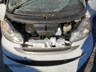 2010 Smart fortwo Pure с VIN WMEEJ3BA4AK363015, выставлен на аукционе Copart как лот 76066204 с пробегом Не указан миль и Списание • Salvage title. История ставок и продаж доступна на DreamBid. Изображение 11.