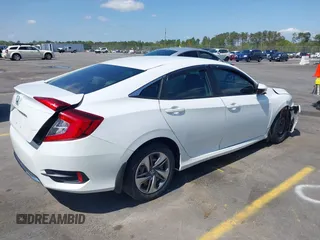 2020 Honda Civic LX with VIN 2HGFC2F61LH568767, listed as a IAAI auction lot 41909755 with 56,213 mi miles and . Bid and sale history available at DreamBid. Image 4.