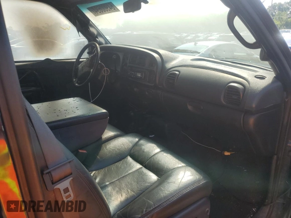 2000 Dodge 2500 z VIN 1B7KF2369YJ131193, wystawiony jako Copart lot #64900694 z przebiegiem 270 394 mil mil oraz Szkoda całkowita • Salvage title. Historia ofert i sprzedaży dostępna na DreamBid. Obrazek 8.