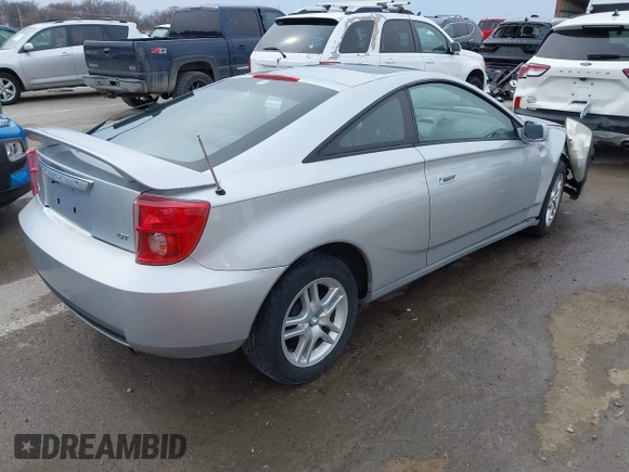 2005 Toyota Celica GT with VIN JTDDR32T950185575, listed as a IAAI auction lot 41710111 with 100,971 mi miles. Bid and sale history available at carsss.com. Image 4.