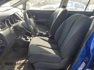 2009 Nissan Versa S with VIN 3N1BC13E19L414565, listed as a Copart auction lot 54275475 with 105,257 mi miles and Salvage Title. Bid and sale history available at DreamBid. Image 7.